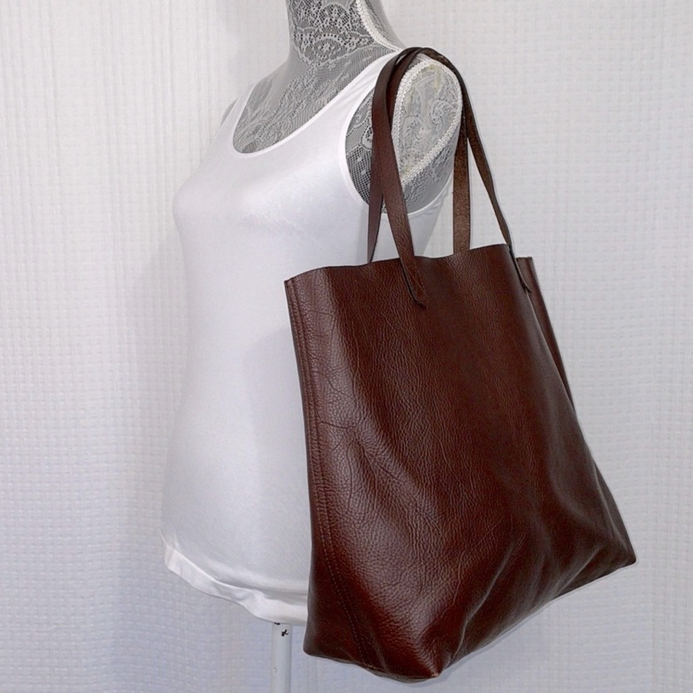 Madewell brown leather tote bag. Interior zipper pocket.  Clean interior!  EUC